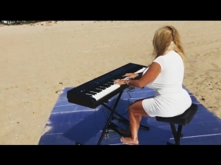 busty beautifully plays the synthesizer
